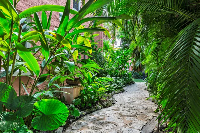 a backyard of a house with lots of green space