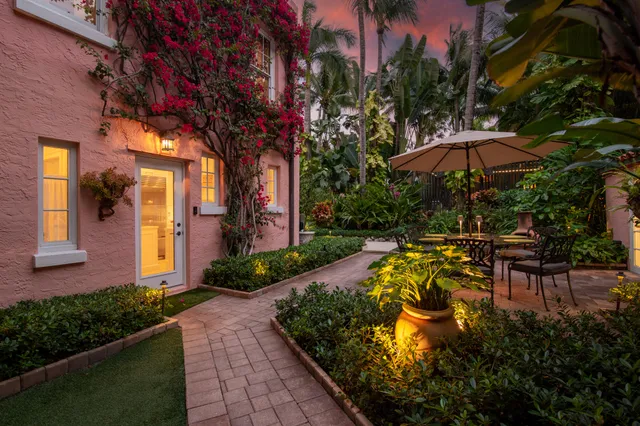 a garden view with a seating space