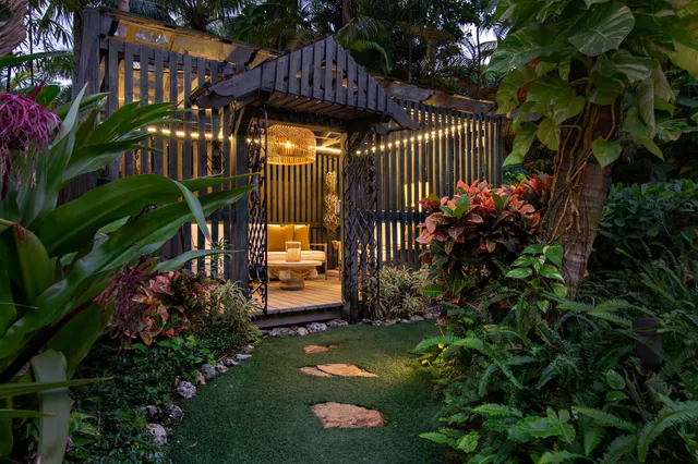 a view of swimming pool with sitting area