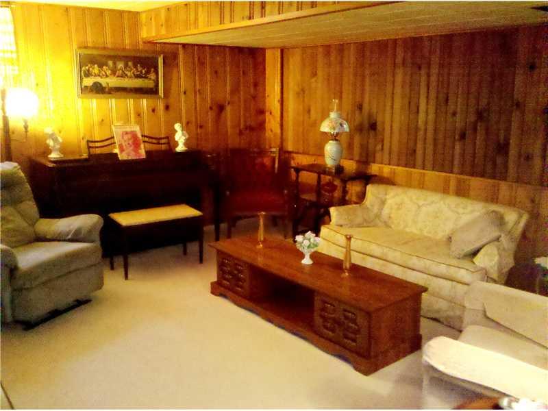 929 Rosalind Road Pittsburgh, PA 15237 - Photo 11 of 13 Family Room. 25 x 13 finished lower level family room is warm and inviting. Separate bar area behind photographer. Also a workshop, storage room, and large laundry this level.