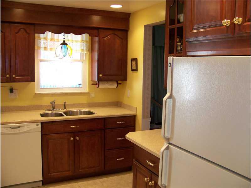 929 Rosalind Road Pittsburgh, PA 15237 - Photo 3 of 13 Kitchen. Beautifully updated kitchen with Corian counter tops, cherry cabinets with slide-out organizers, newer appliances, ceramic tile and recessed lighting! Very nice!