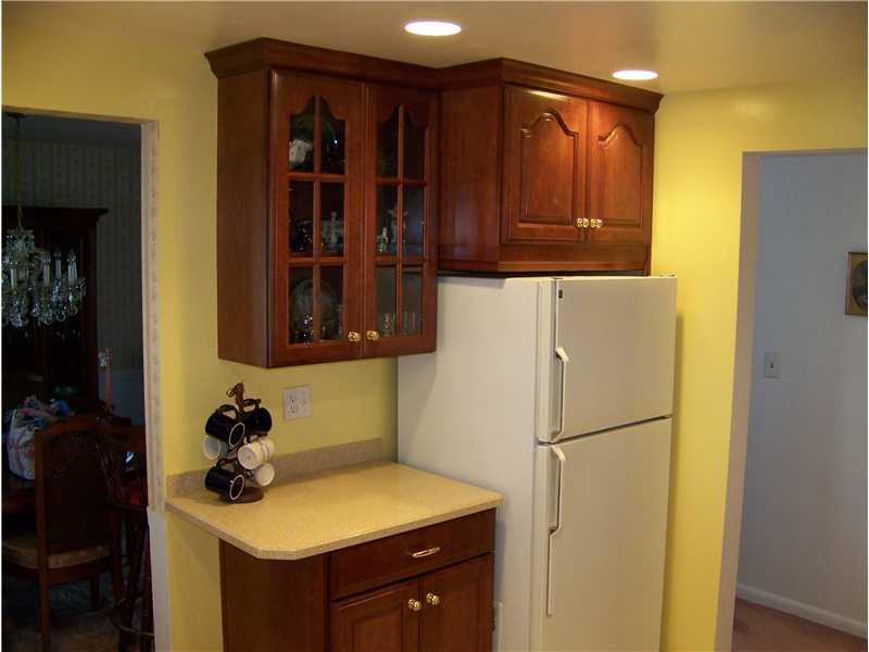 929 Rosalind Road Pittsburgh, PA 15237 - Photo 5 of 13 Kitchen. Glass-front cabinetry in this section. Ample storage and nice layout to this kitchen.