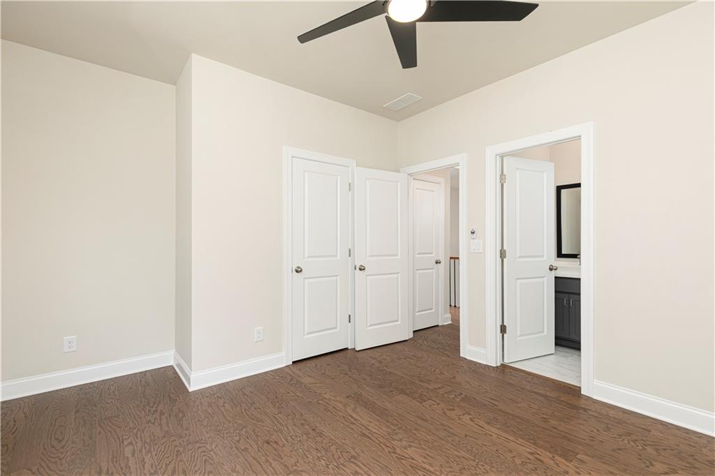 2475 Stewart Road Cumming, GA 30041 - Photo 28 of 30 wooden floor in an empty room