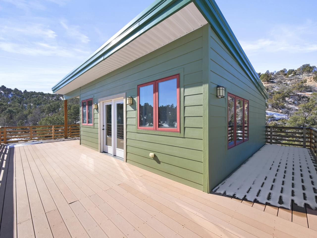 18461 Little Park Road Glade Park, CO 81523 - Photo 28 of 42 a front view of a house with a garden