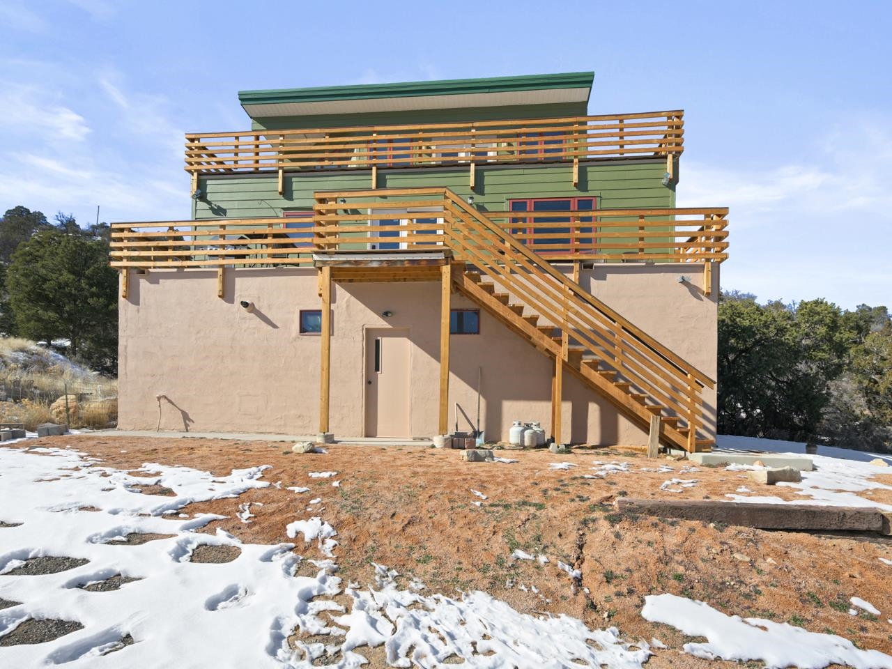 18461 Little Park Road Glade Park, CO 81523 - Photo 30 of 42 a view of a building with snow on the road