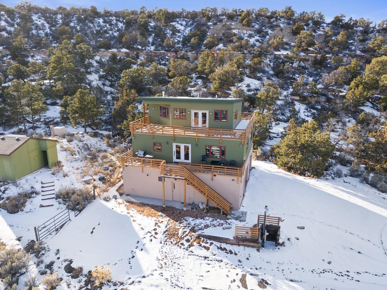 18461 Little Park Road Glade Park, CO 81523 - Photo 37 of 42 a view of a house with a yard