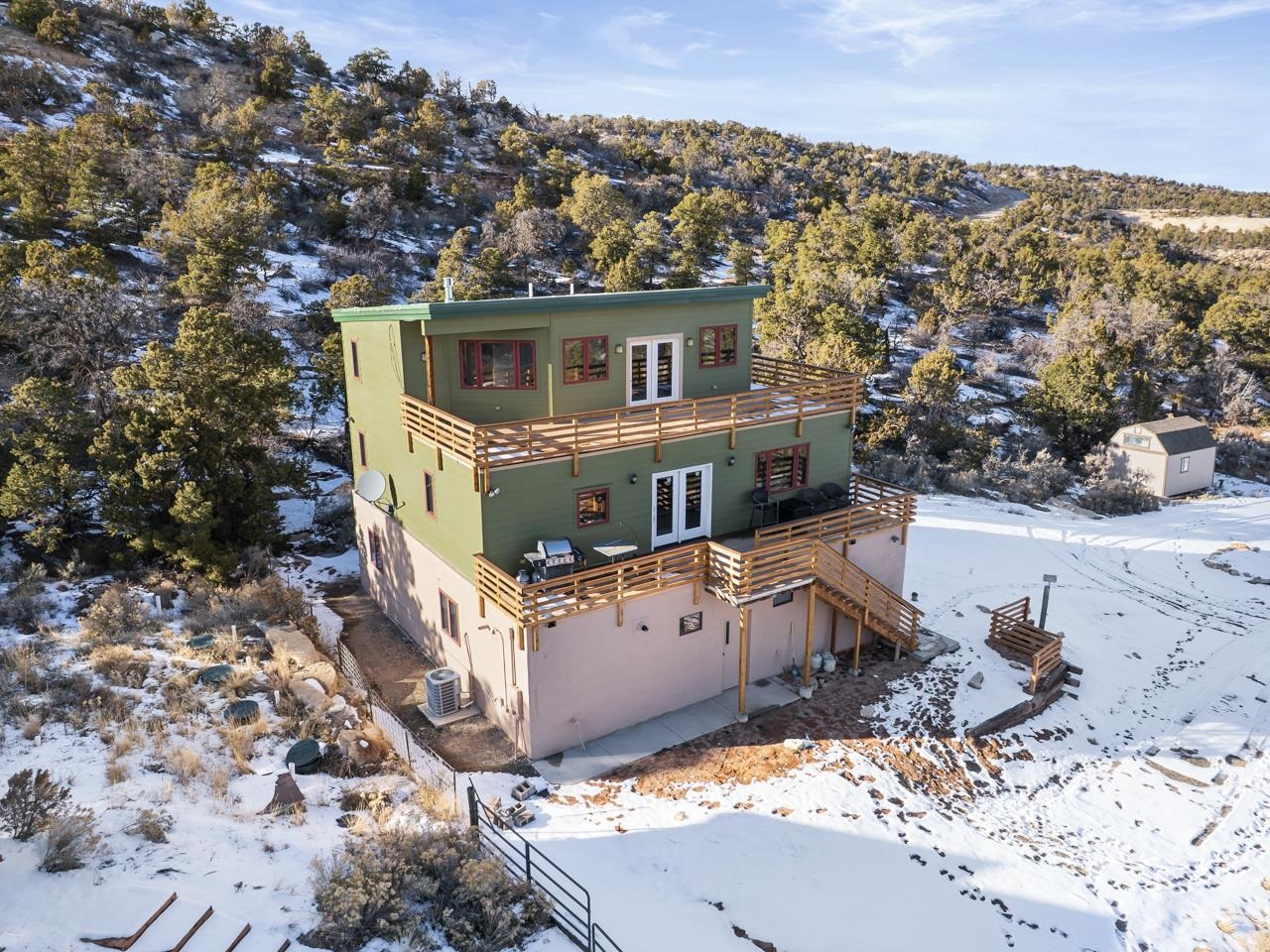 18461 Little Park Road Glade Park, CO 81523 - Photo 38 of 42 a view of a house with a yard