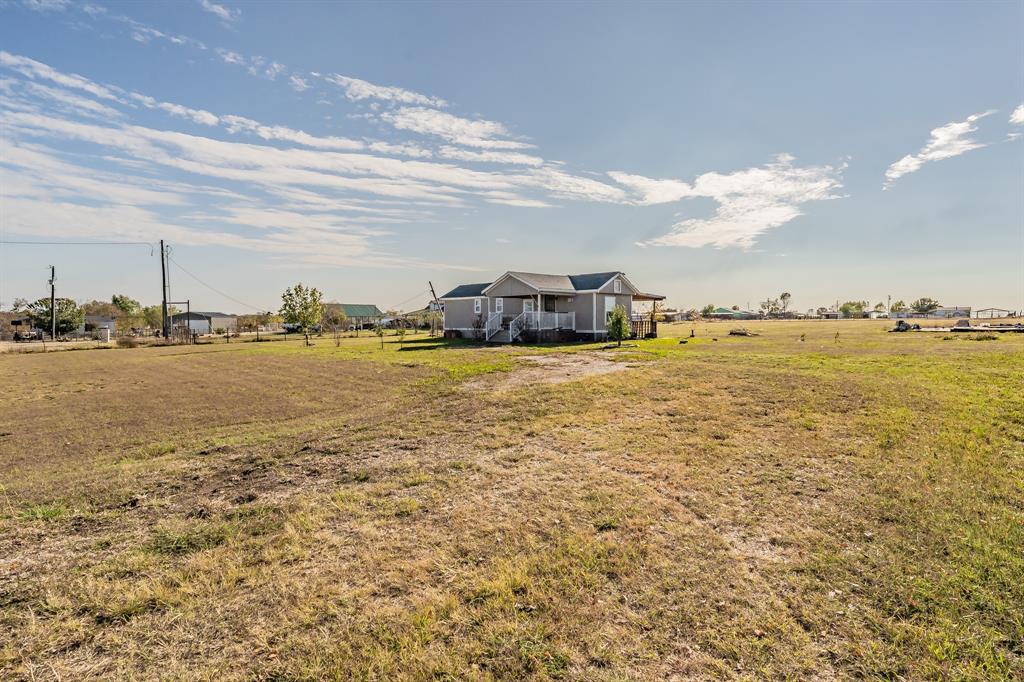 1080 Crow Lane Terrell, TX 75161 - Photo 18 of 39 View of green lawn with a view of countryside