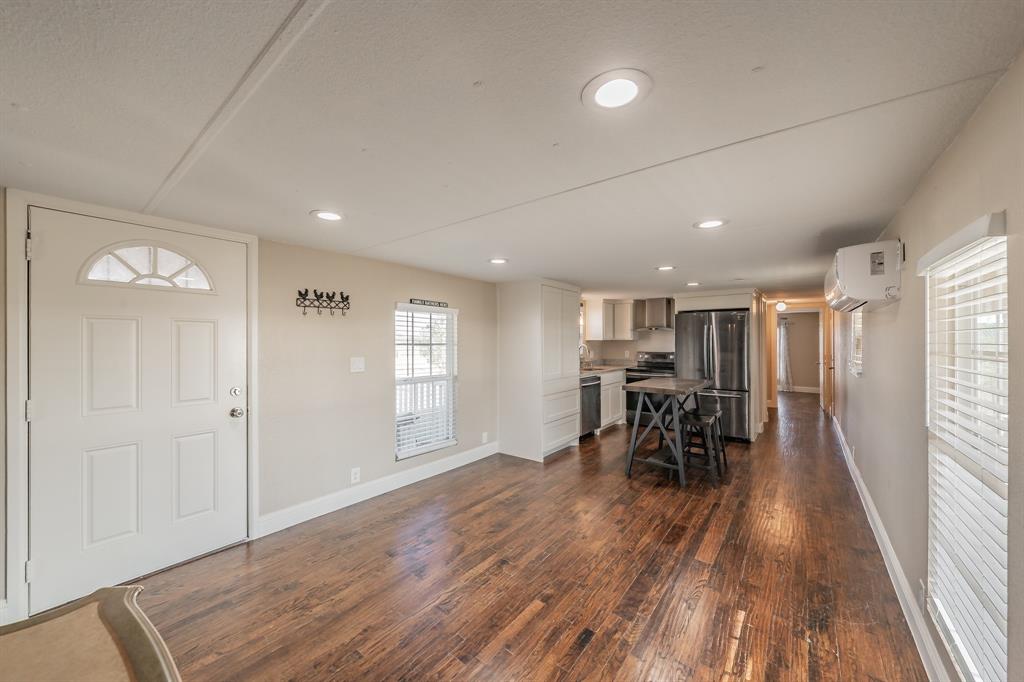 1080 Crow Lane Terrell, TX 75161 - Photo 6 of 39 Entryway featuring dark wood-style flooring and recessed lighting