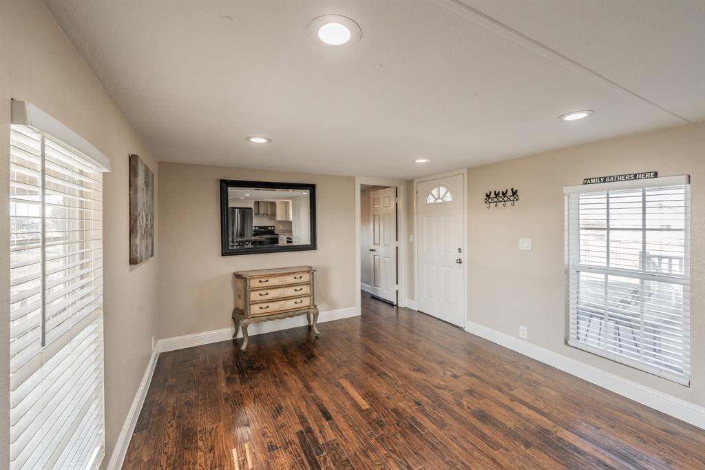 1080 Crow Lane Terrell, TX 75161 - Photo 7 of 39 Living room dark wood-style flooring and recessed lighting