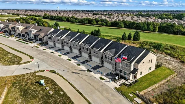 a view of yard with swimming pool and green space