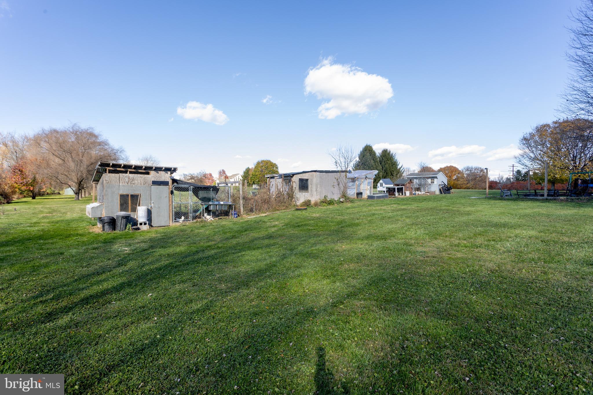 4210 Graceton Road Pylesville, MD 21132 - Photo 62 of 64 a backyard of a house with table and chairs
