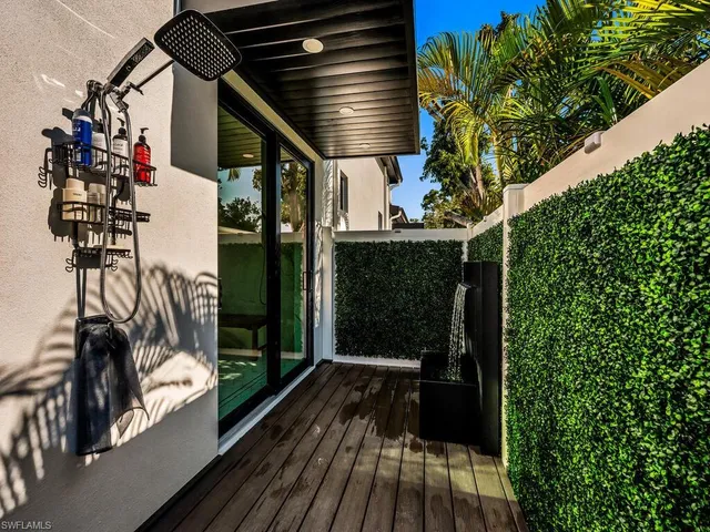 a bedroom with bed and a window