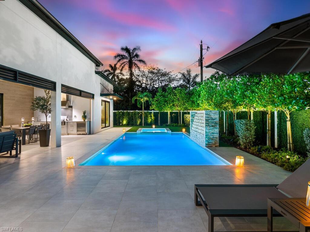 1251 Creech Road Naples, FL 34103 - Photo 37 of 44 a view of outdoor space yard and patio