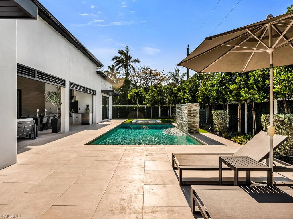 1251 Creech Road Naples, FL 34103 - Photo 41 of 42 a view of outdoor space yard deck and outdoor seating