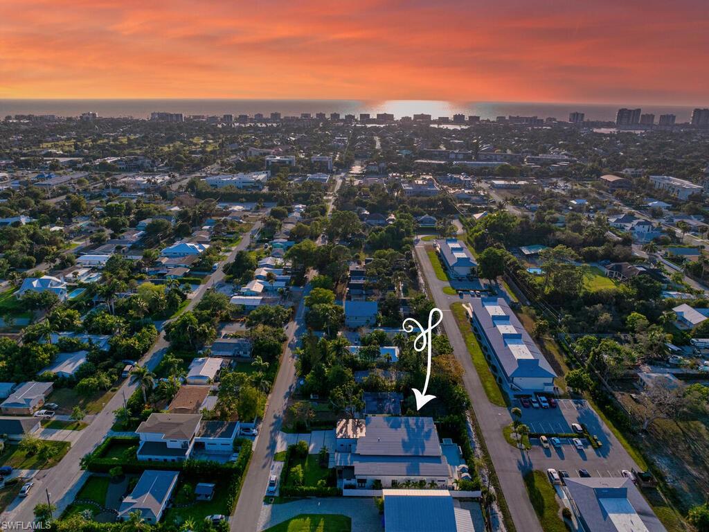 1251 Creech Road Naples, FL 34103 - Photo 43 of 44 an aerial view of city