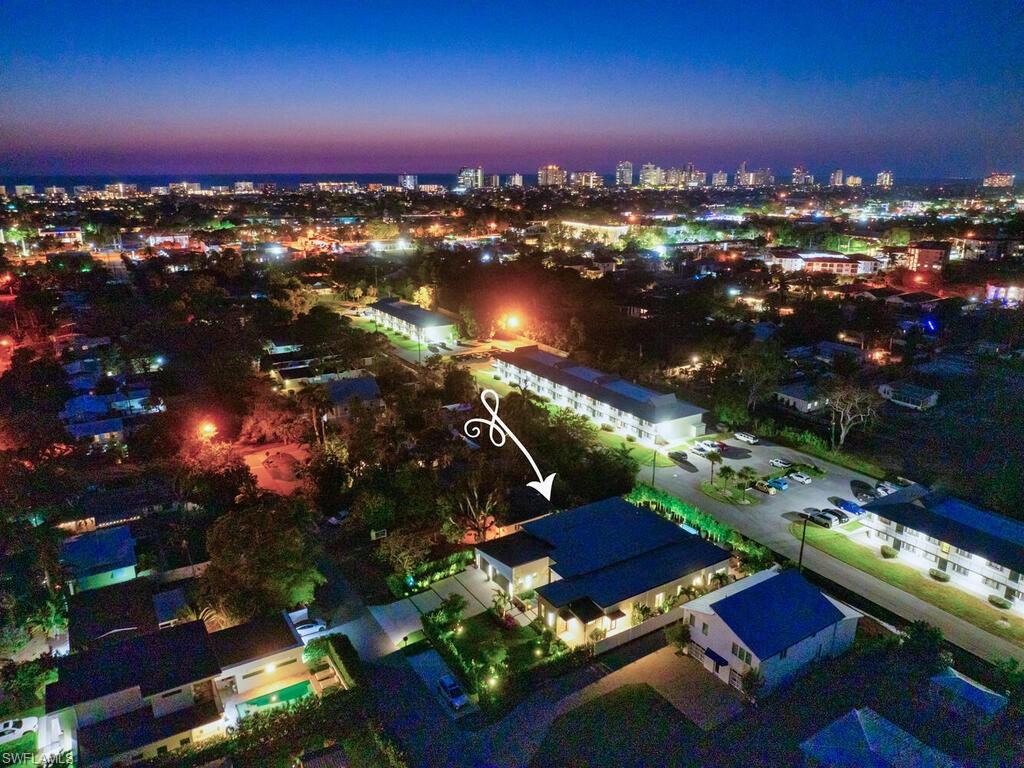 1251 Creech Road Naples, FL 34103 - Photo 44 of 44 an aerial view of a city