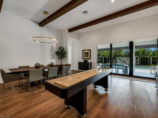 a view of a livingroom with furniture and window