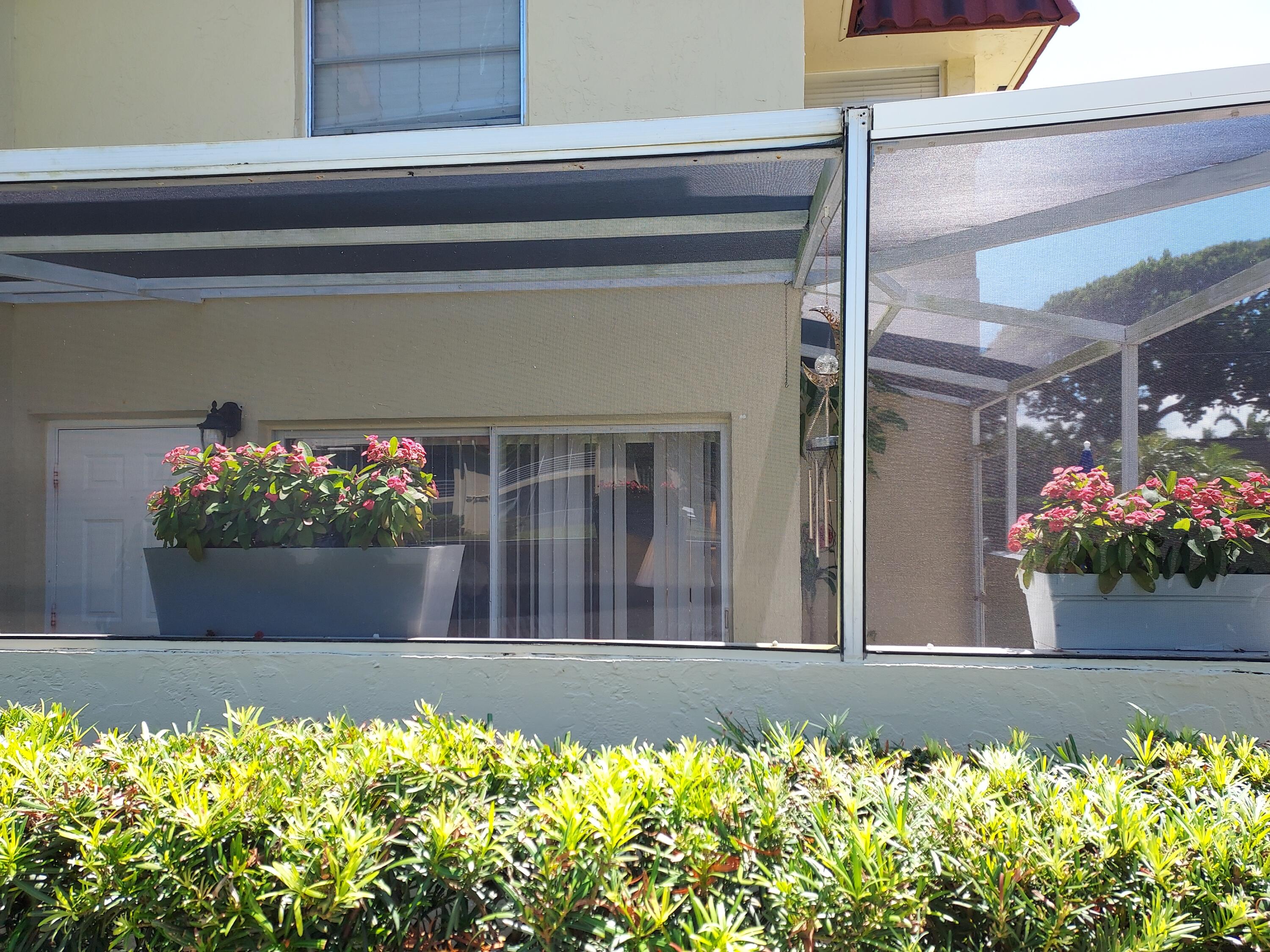 717 Highway 1, Unit 911 Jupiter, FL 33477 - Photo 25 of 32 Screened-in Patio