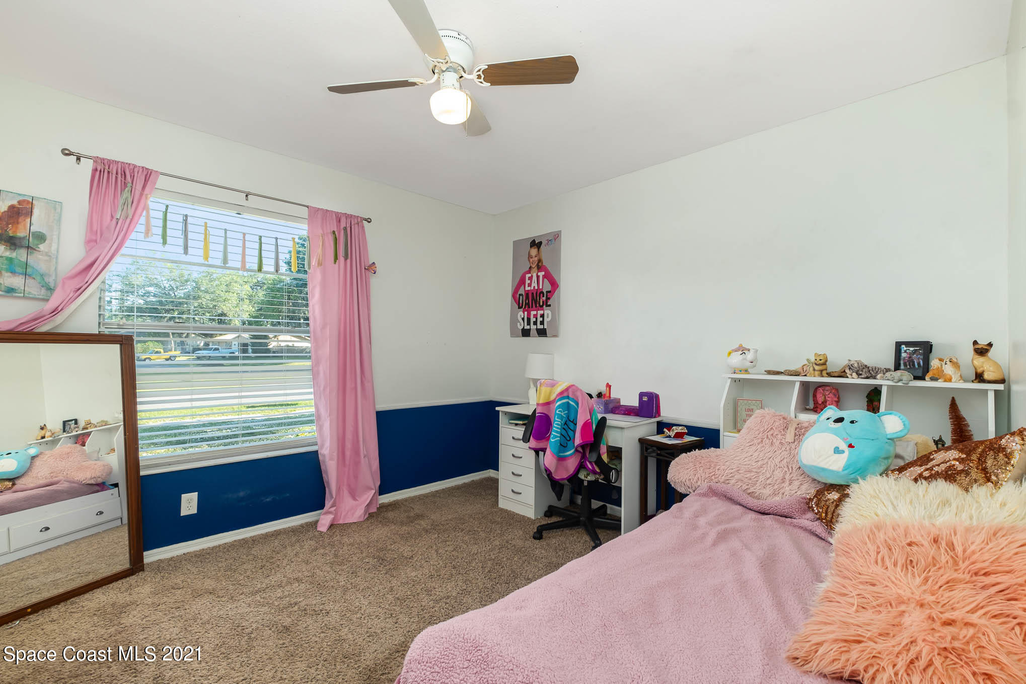 3750 Ranger Street Titusville, FL 32796 - Photo 17 of 22 a bed room with a bed and a window