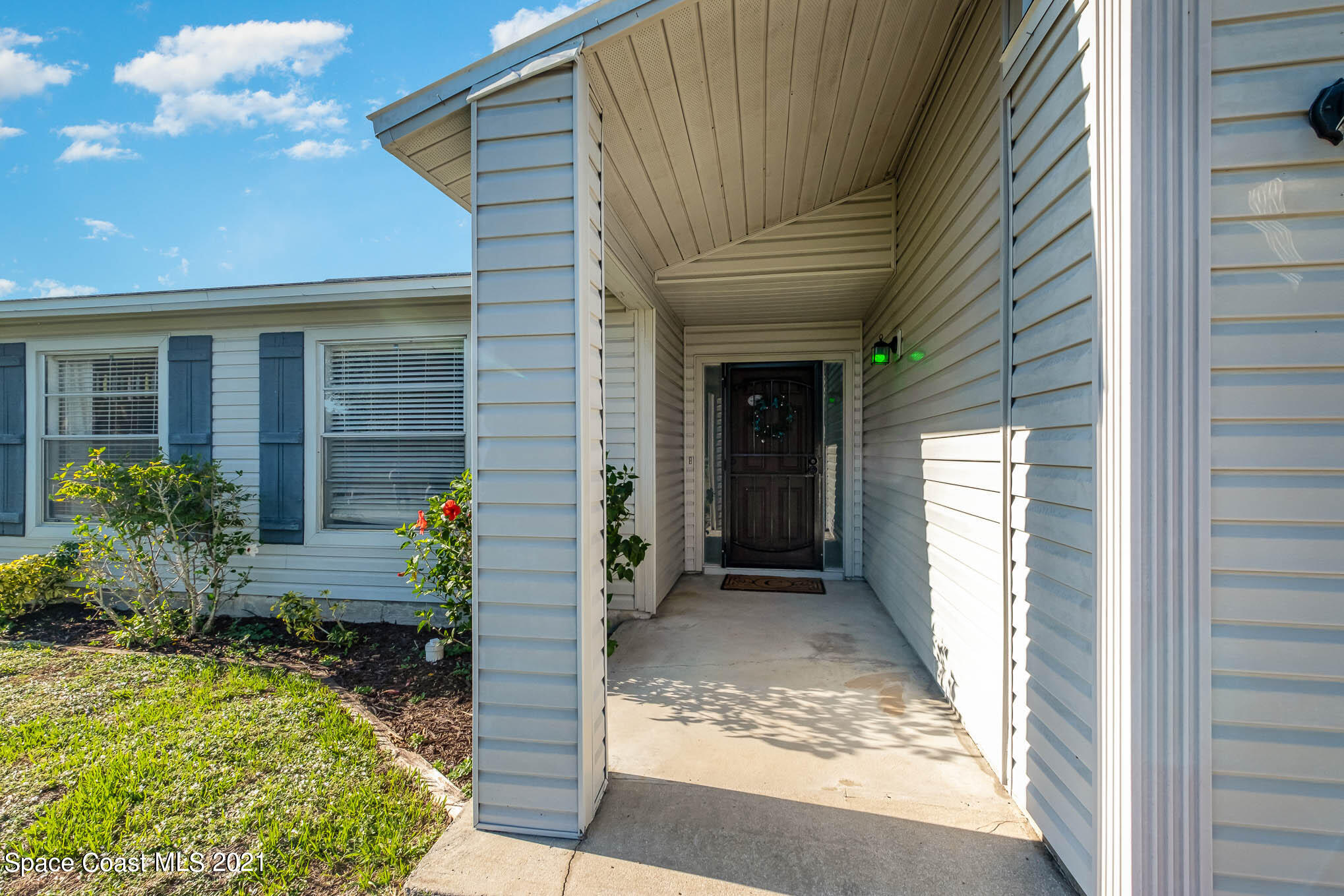 3750 Ranger Street Titusville, FL 32796 - Photo 3 of 22 a view of a entryway door front of house