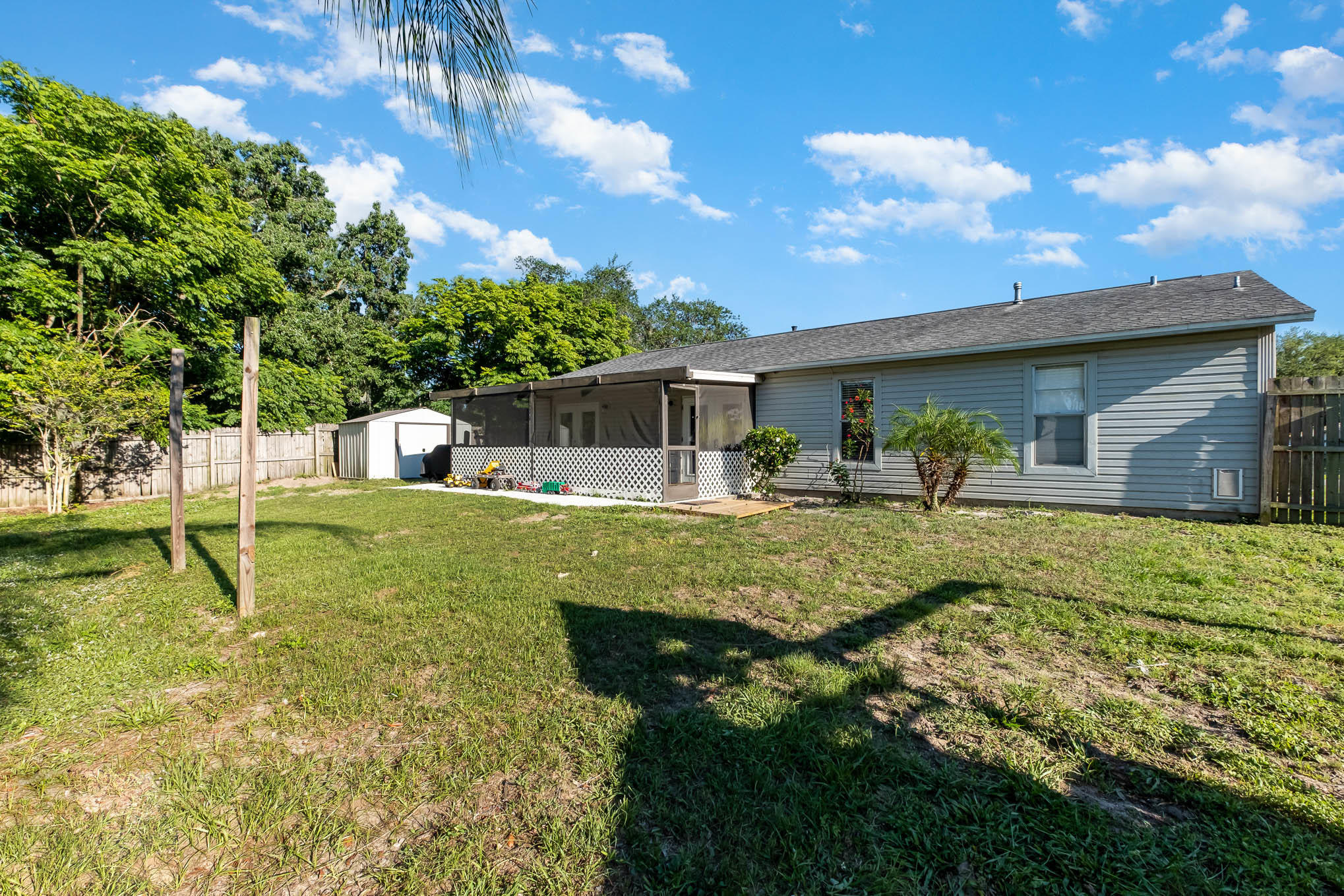 3750 Ranger Street Titusville, FL 32796 - Photo 21 of 22 a swimming pool with outdoor seating and yard