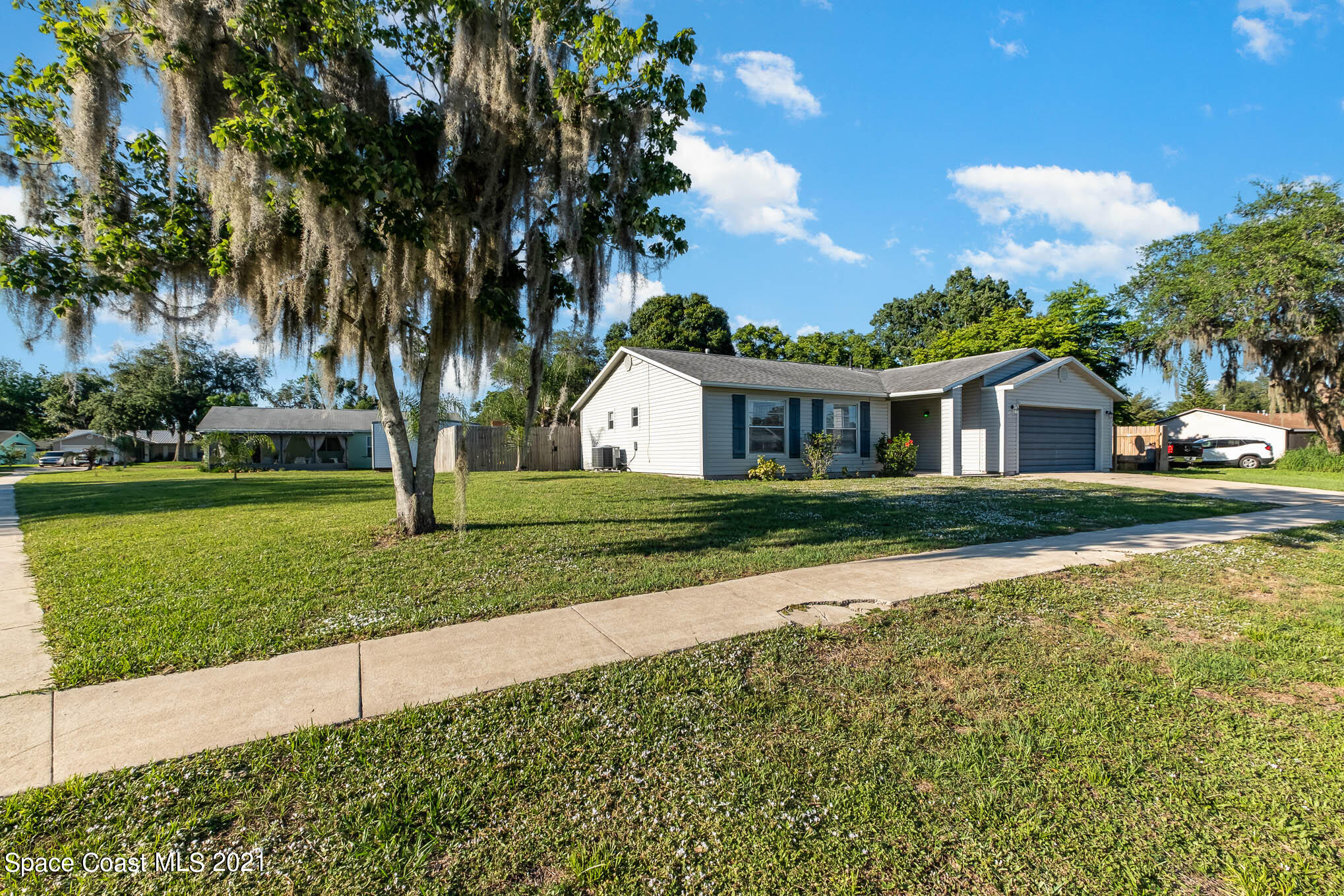 3750 Ranger Street Titusville, FL 32796 - Photo 22 of 22 a view of a house with a yard