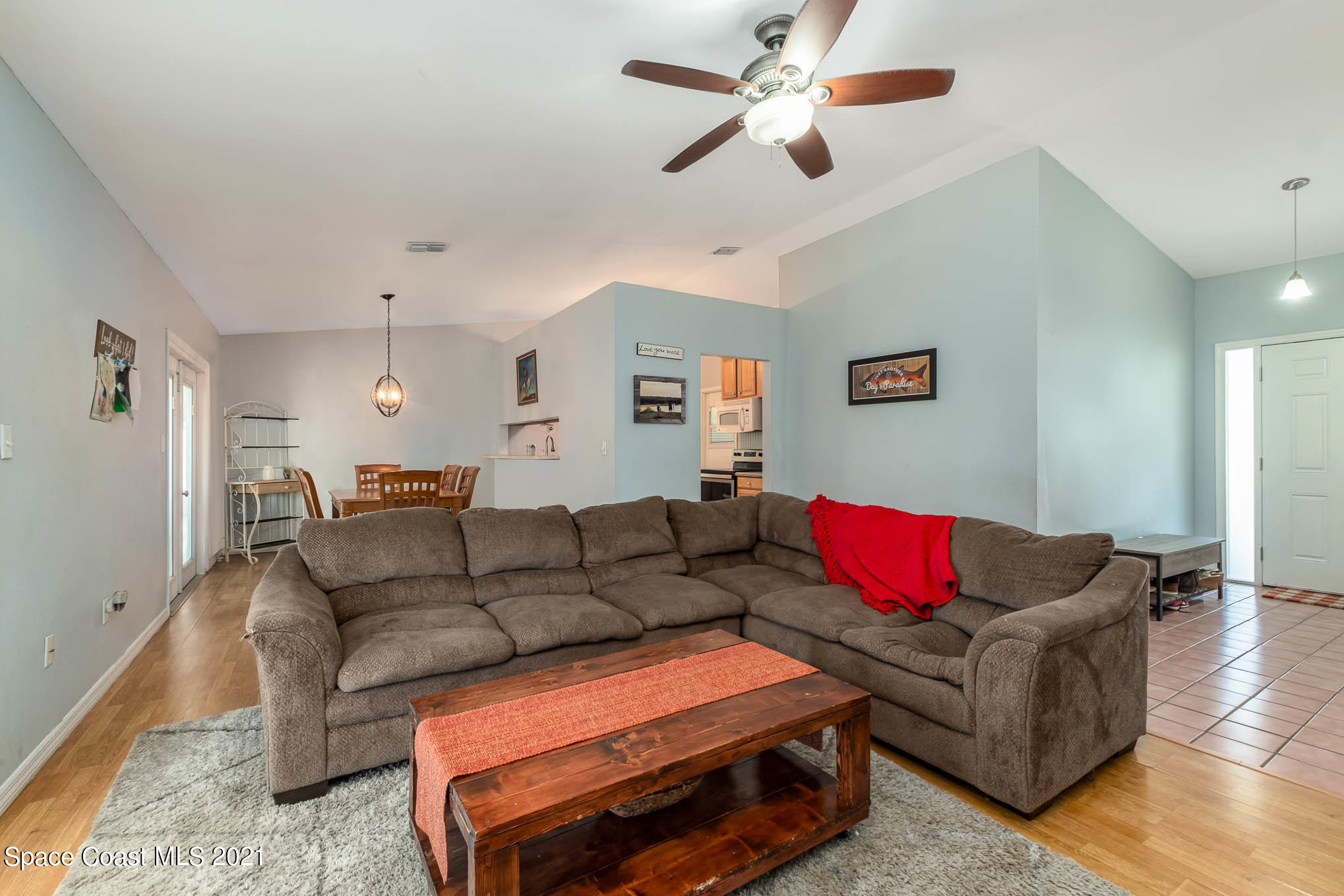 3750 Ranger Street Titusville, FL 32796 - Photo 5 of 22 a living room with furniture and a wooden floor