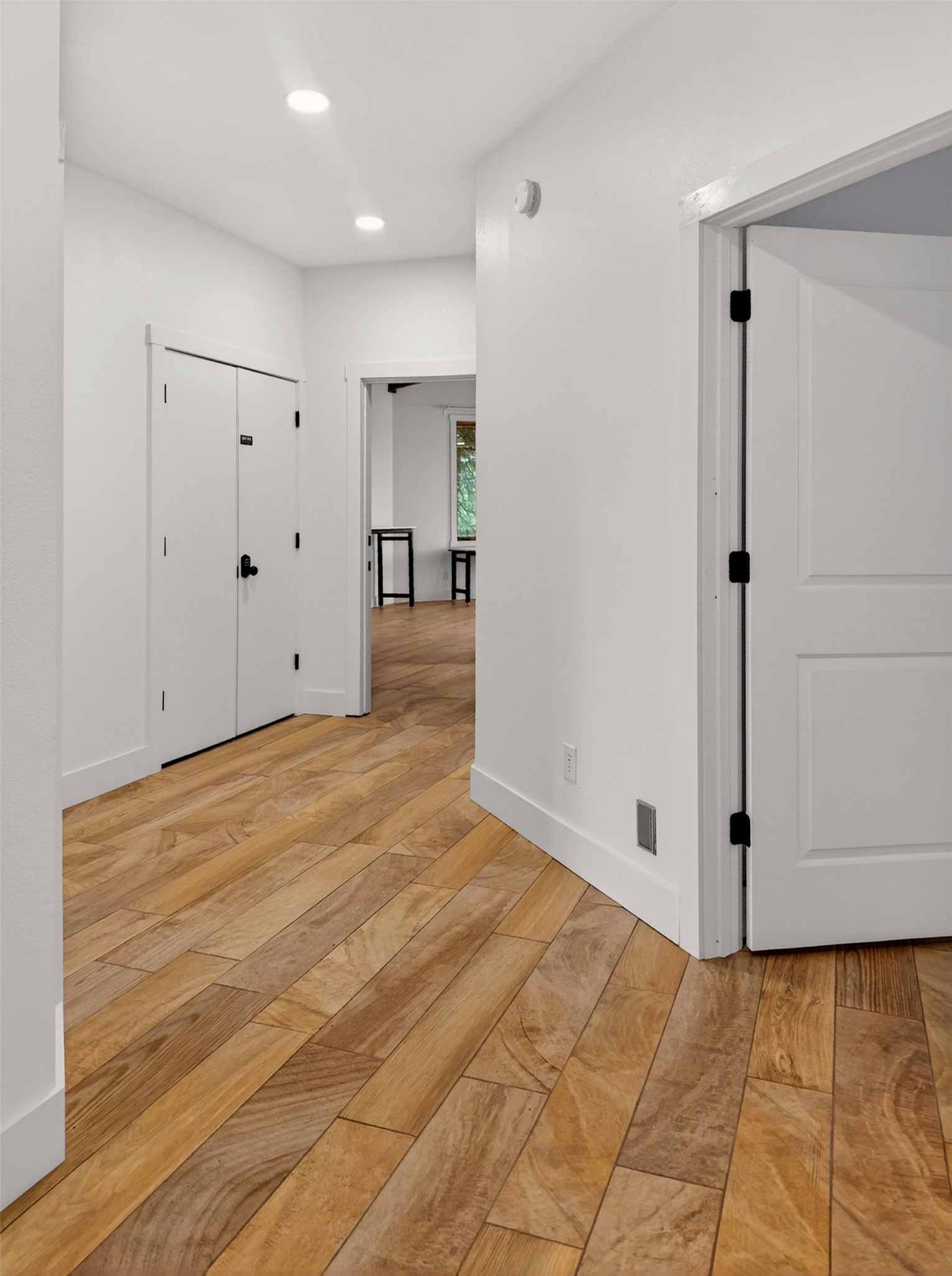 6106 Southeast Fm Ranch Buckholts, TX 76518 - Photo 13 of 38 This interior space features light-toned wood flooring, white walls, and recessed lighting