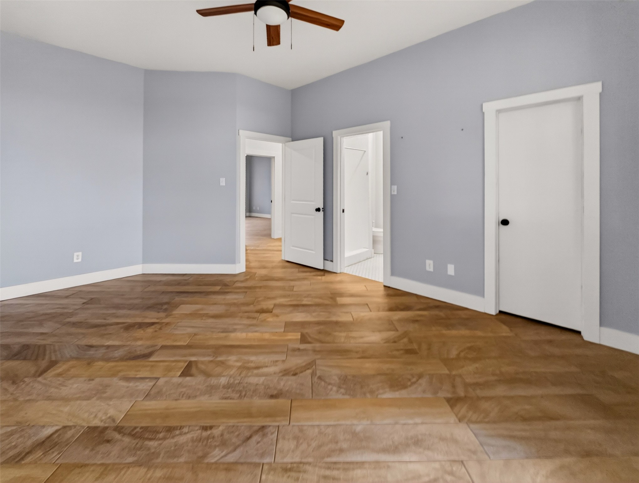 6106 Southeast Fm Ranch Buckholts, TX 76518 - Photo 15 of 38 This expansive room features light-colored walls, wood-look flooring, and a ceiling fan