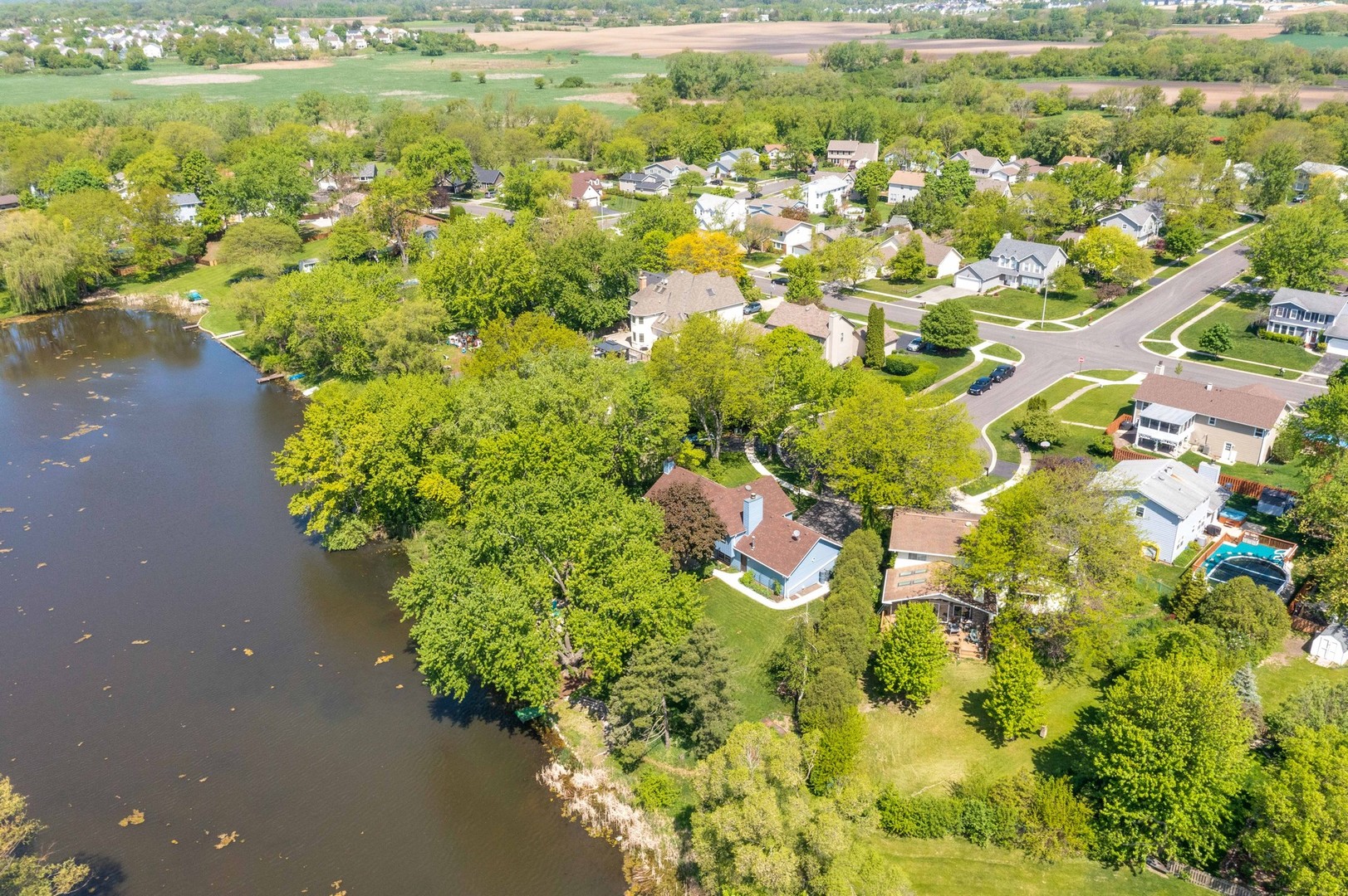 2351 Federal Circle Lindenhurst, IL 60046 - Photo 23 of 26 a view of a lake with a yard