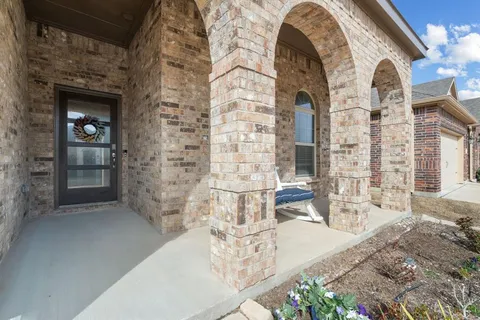 a view of a living room and entry way