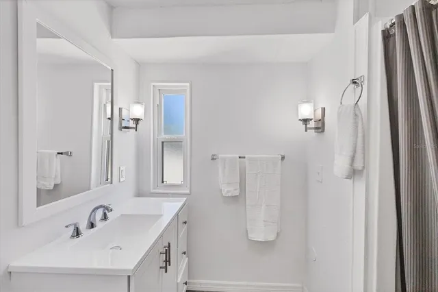 a bathroom with a sink and a toilet