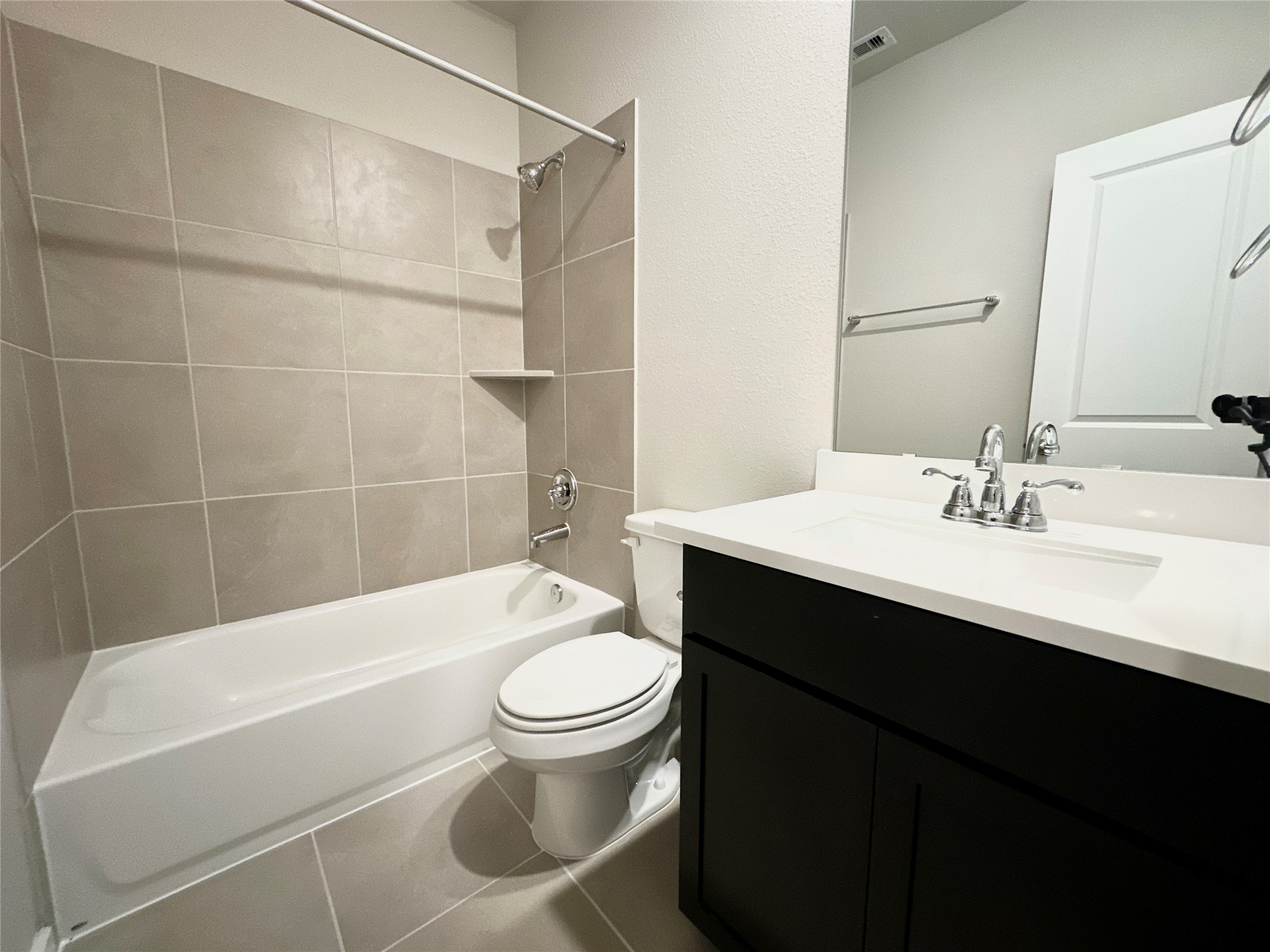 12164 Ridge Top Drive Conroe, TX 77304 - Photo 10 of 23 a bathroom with a sink toilet and shower