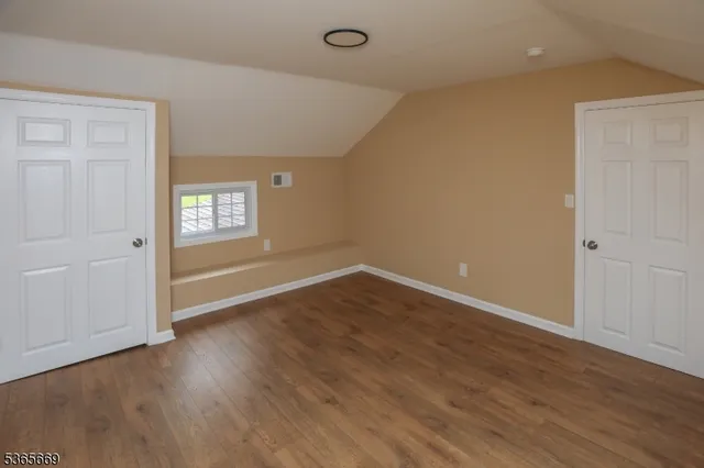 a view of a backyard of the house