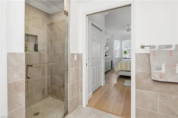a bathroom with a tub and shower
