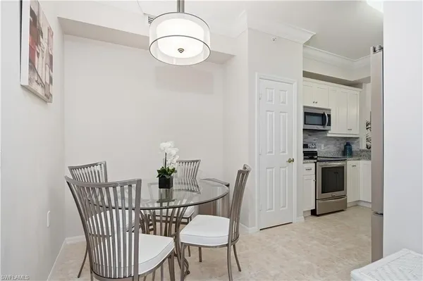 a view of a dining room with furniture