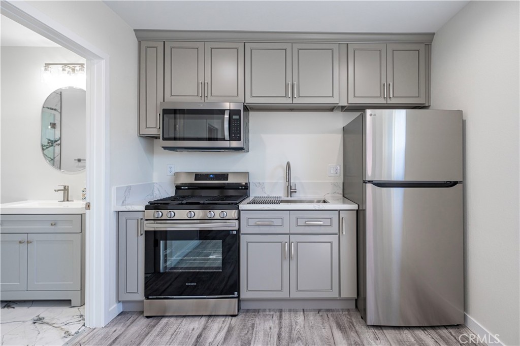 8703 Walker Street Cypress, CA 90630 - Photo 4 of 23 Kitchen- Appliances Included!