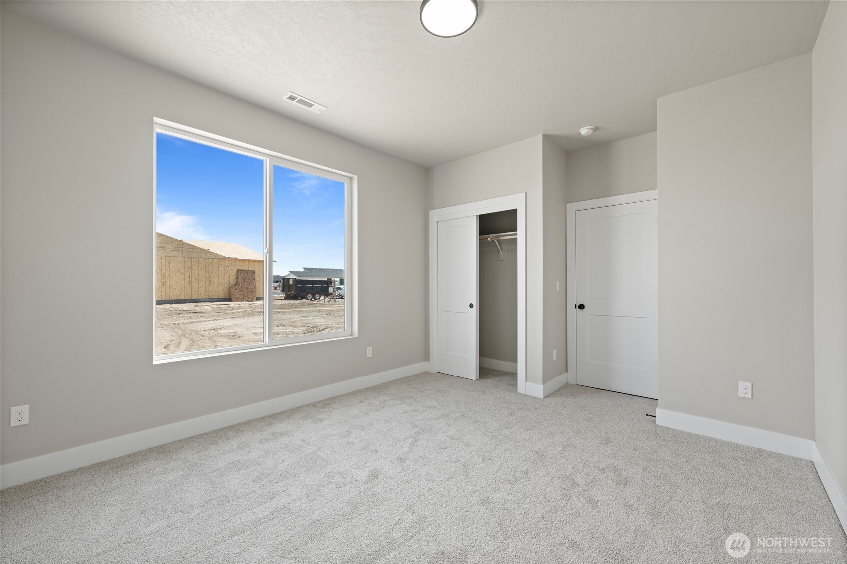 1229 E Mount Othello, WA 99344 - Photo 8 of 31 an empty room with a empty space and window