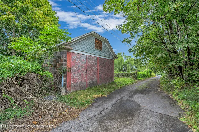 a view of backyard with green space