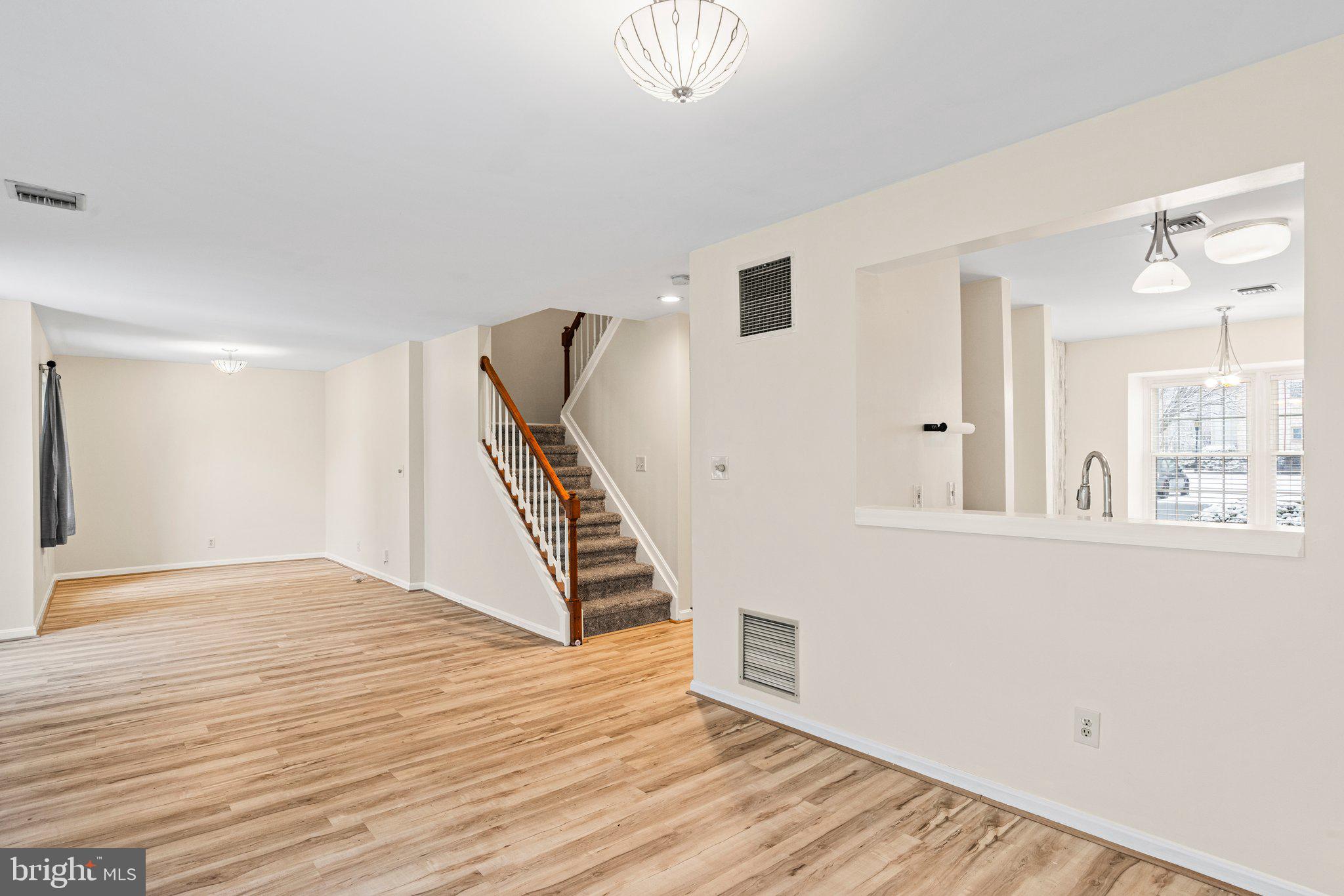 207 Crescent Drive Hershey, PA 17033 - Photo 22 of 42 a view of an empty room with wooden floor and a window