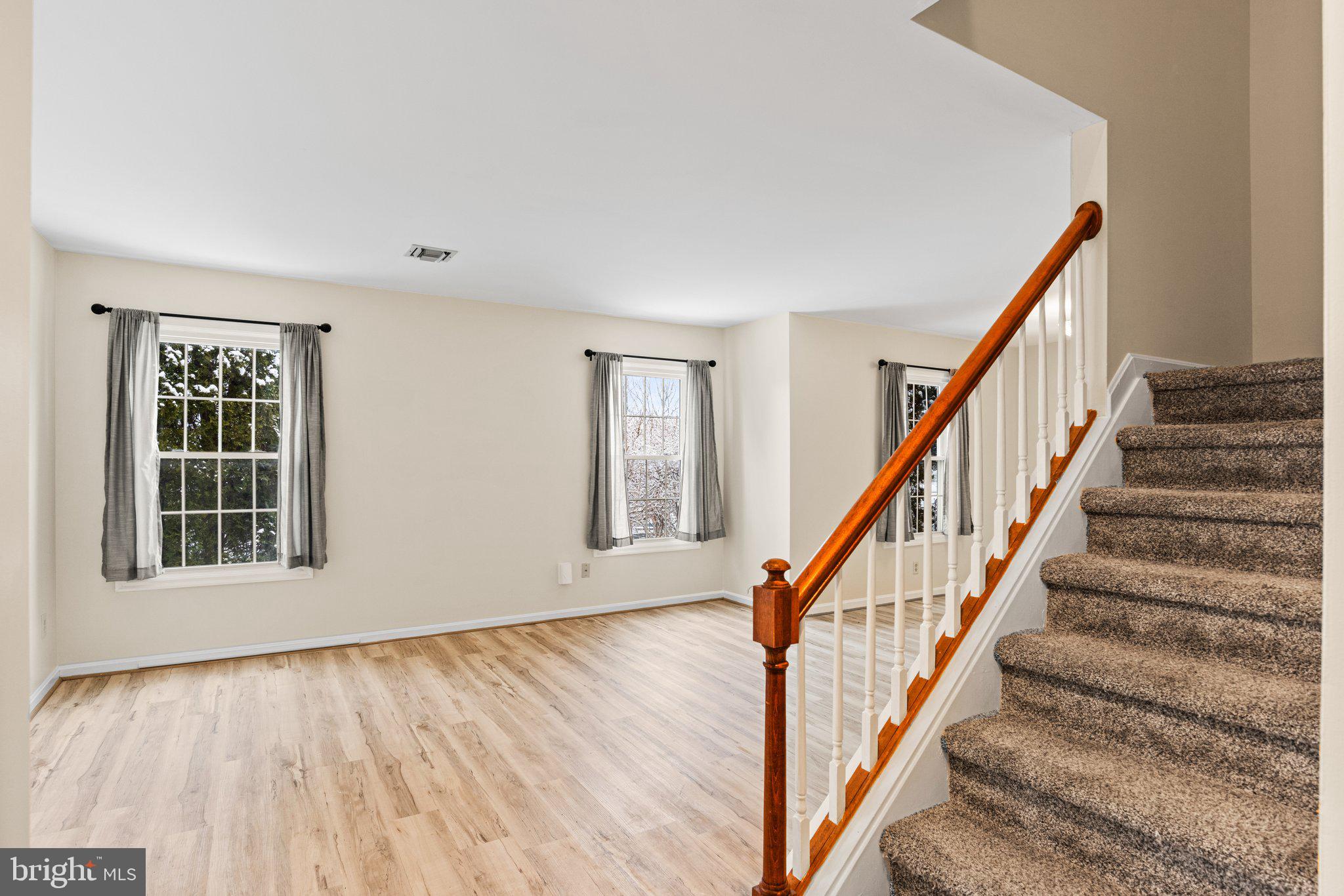 207 Crescent Drive Hershey, PA 17033 - Photo 23 of 42 a view of an entryway with wooden floor and stairs