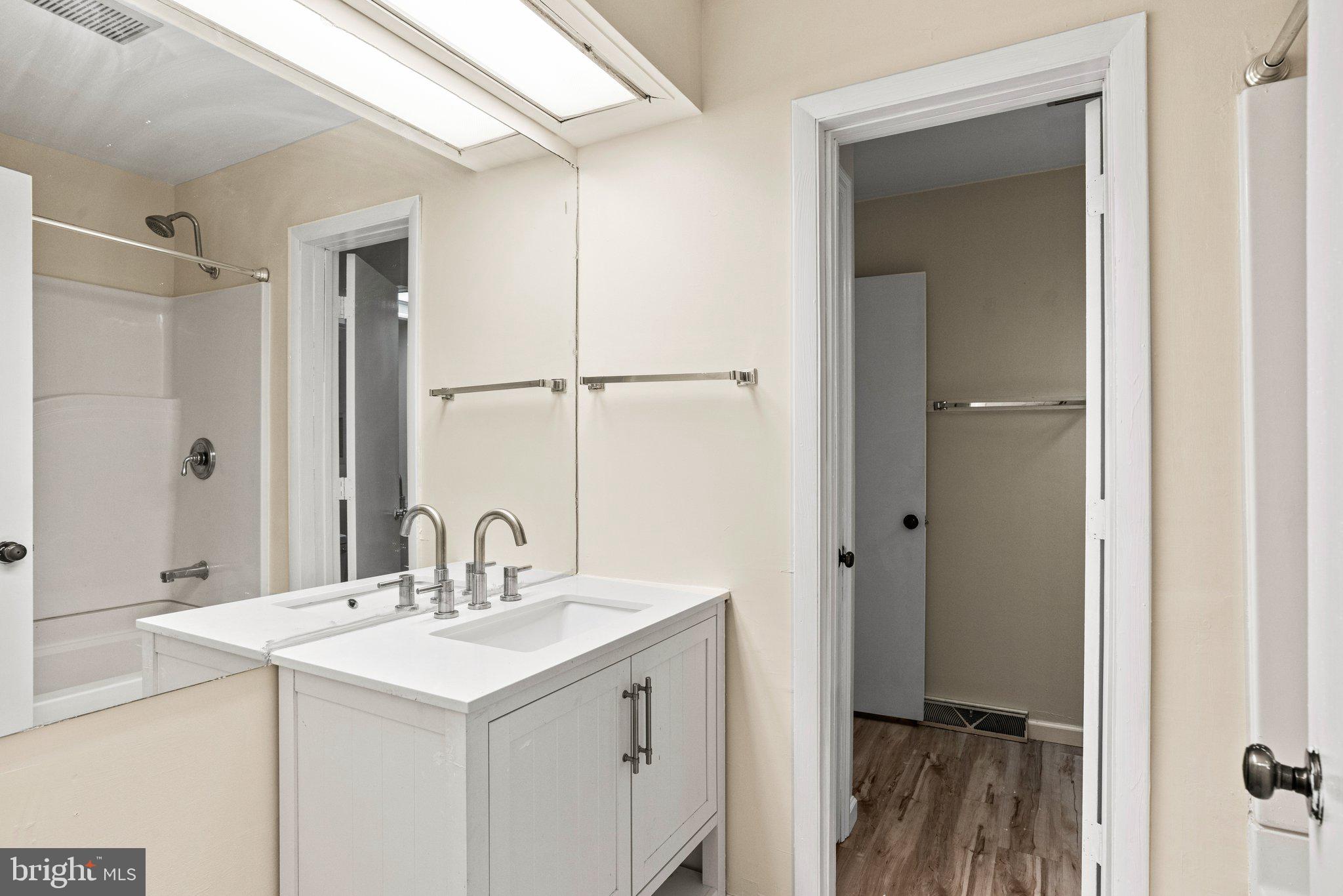 207 Crescent Drive Hershey, PA 17033 - Photo 37 of 42 a bathroom with a sink and a mirror