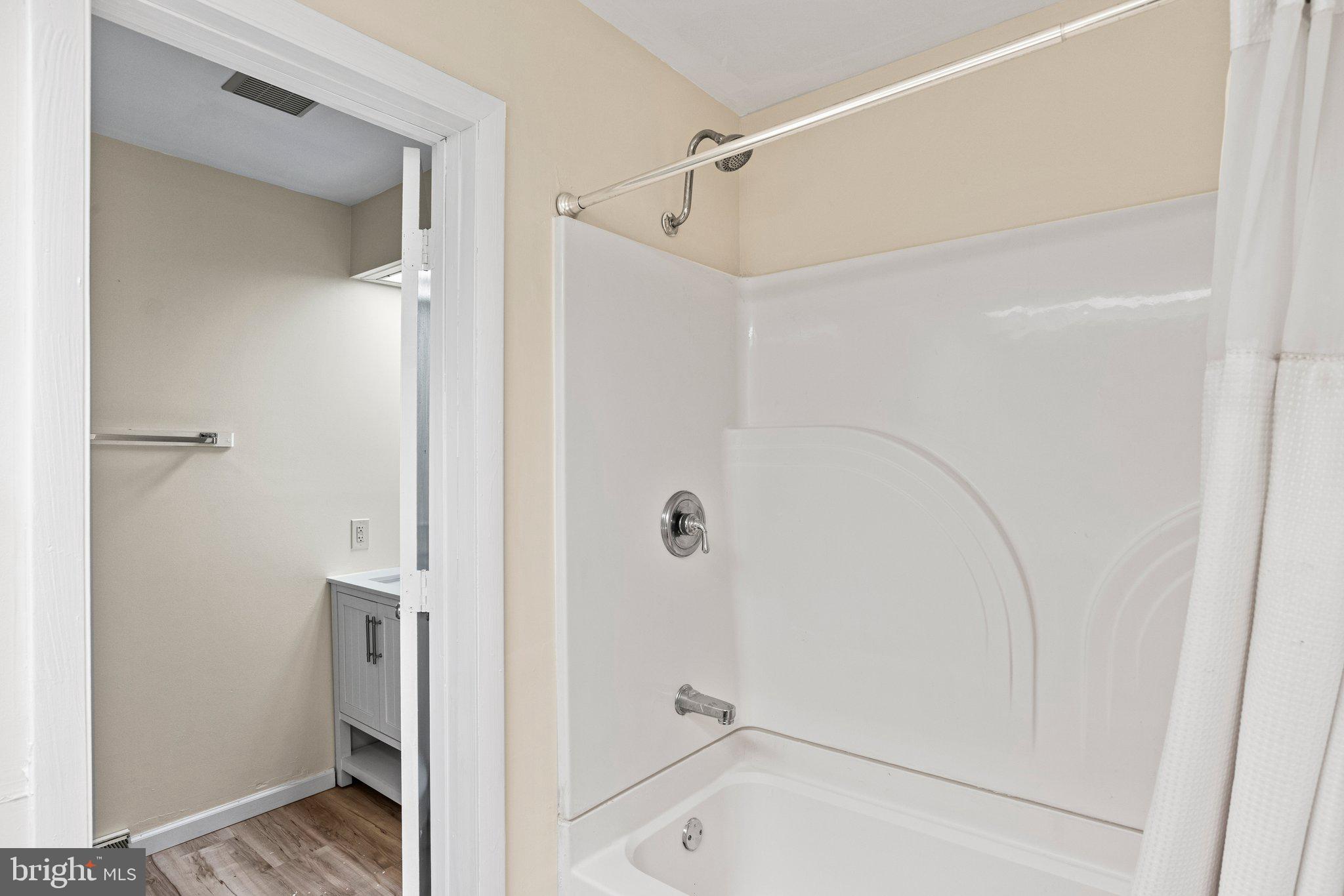 207 Crescent Drive Hershey, PA 17033 - Photo 38 of 42 a bathroom with a bathtub and a shower