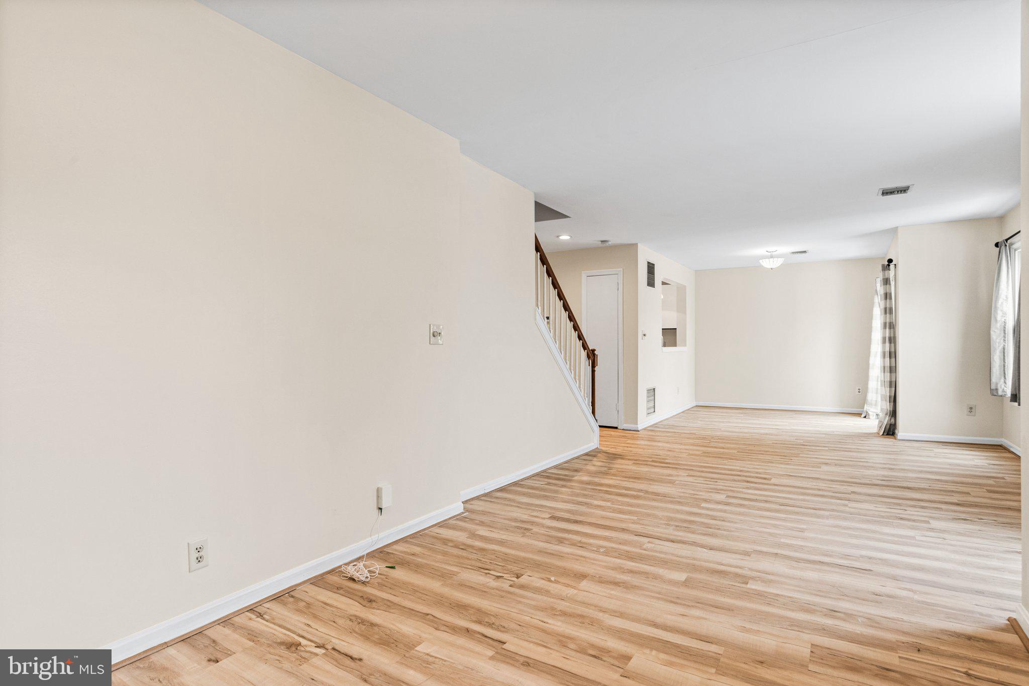 207 Crescent Drive Hershey, PA 17033 - Photo 10 of 42 a view of empty room with wooden floor