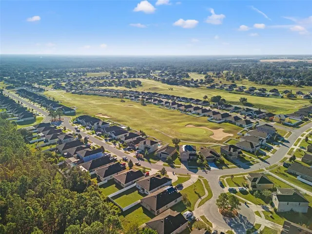 a view of a city with an ocean