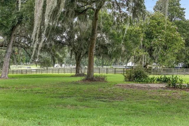 a view of a lake view with a big yard