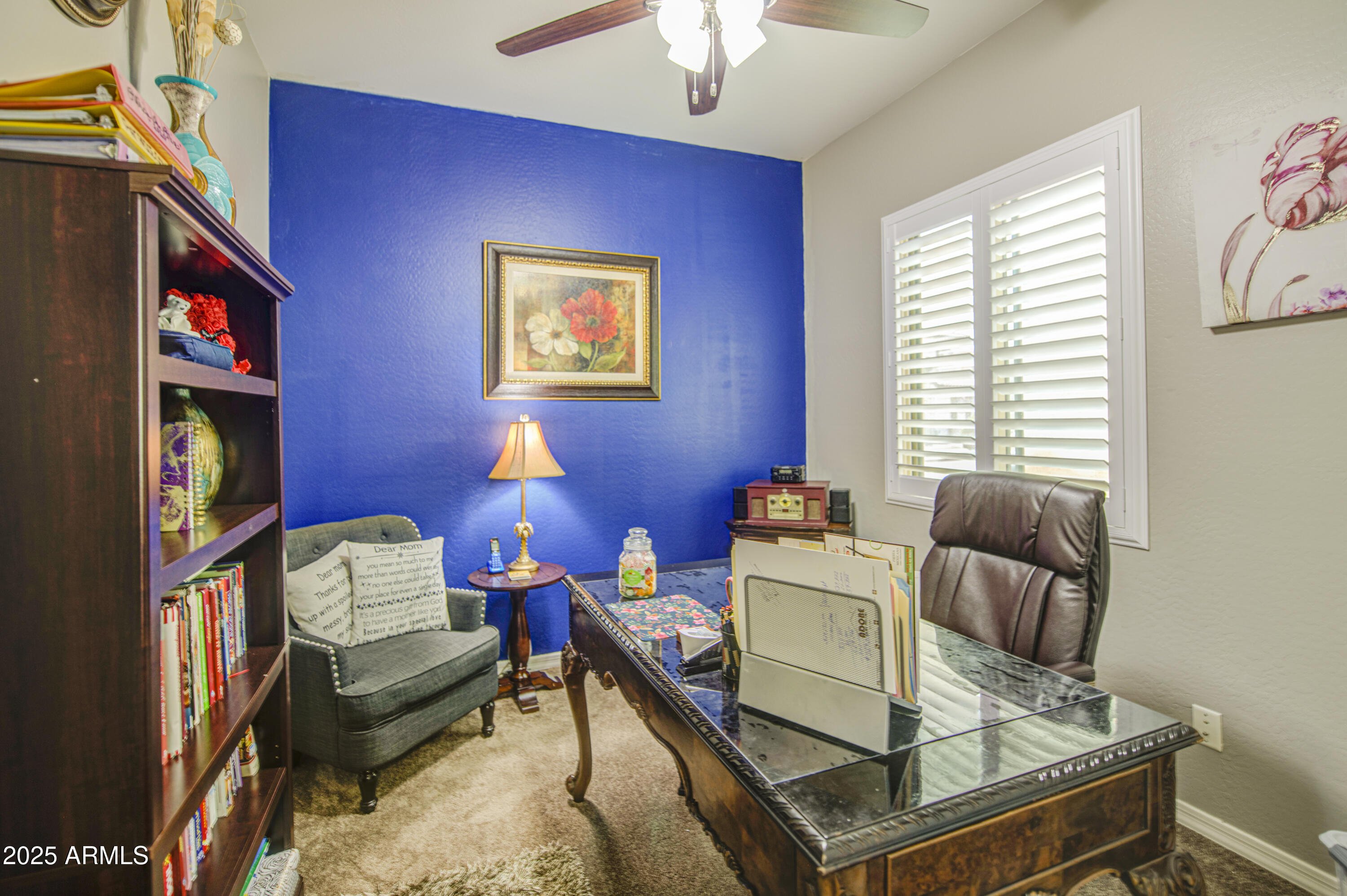 14304 West Coronado Road Goodyear, AZ 85395 - Photo 18 of 66 a living room with furniture and a window
