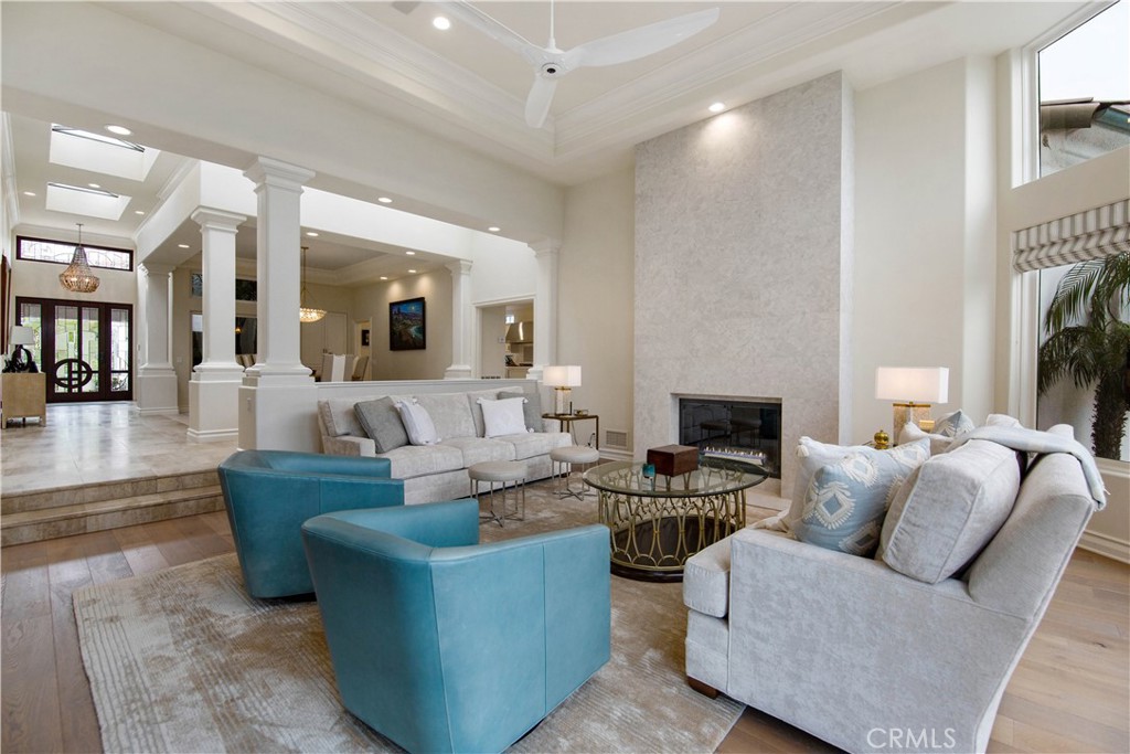 27 Marbella Dana Point, CA 92629 - Photo 15 of 66 a living room with furniture and a fireplace