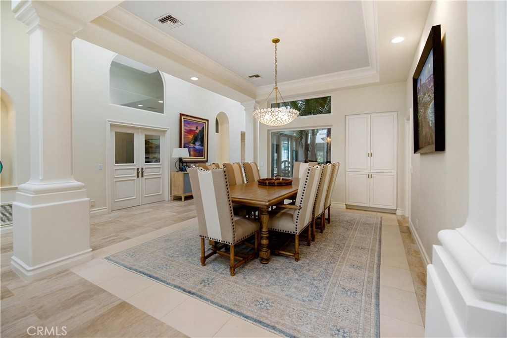 27 Marbella Dana Point, CA 92629 - Photo 18 of 66 a view of a dining room with furniture window and wooden floor